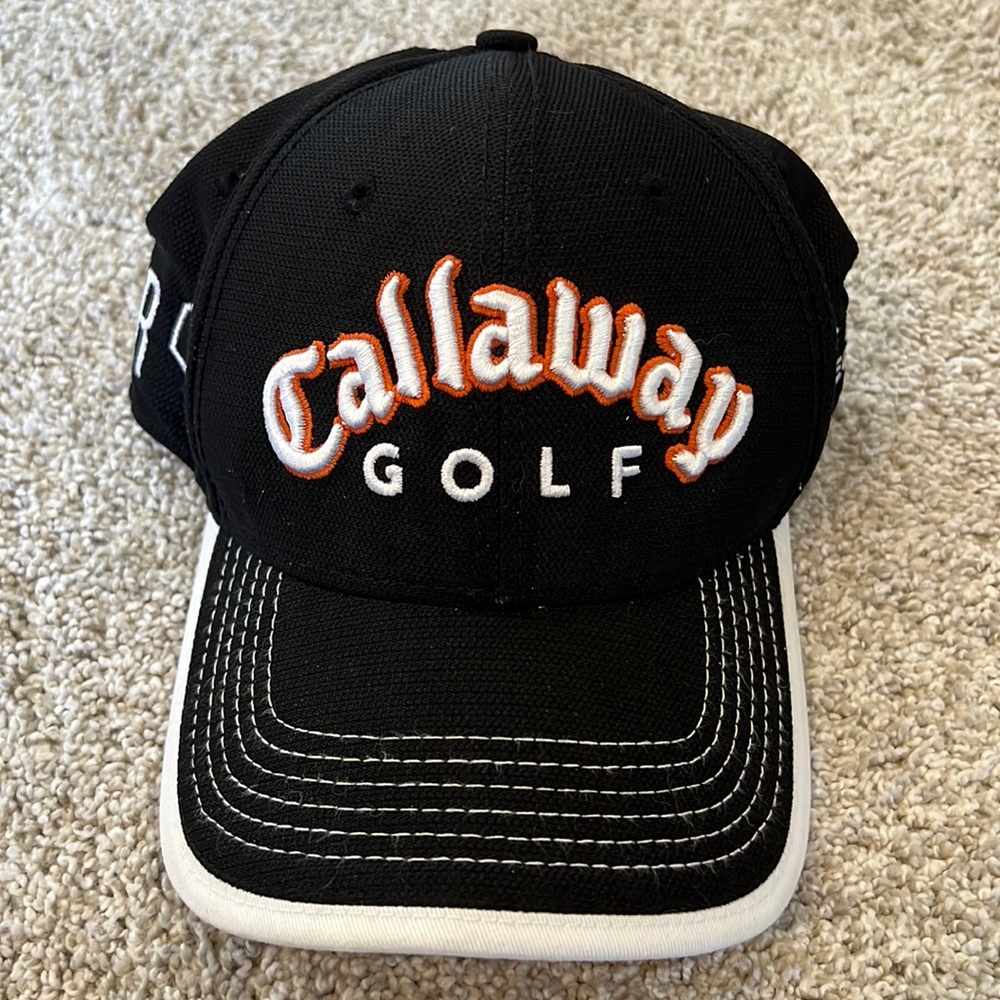 Callaway golf hat, one size fits all. Black with white and orange accents.